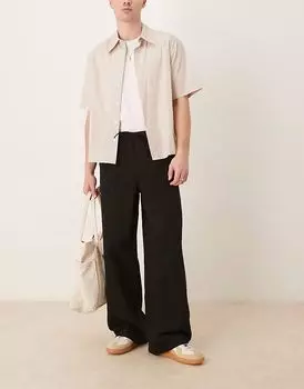 Супермешковатые брюки ASOS DESIGN с застежкой-молнией и вытачками черного цвета