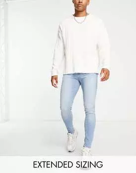 Светло-голубые эластичные джинсы ASOS DESIGN