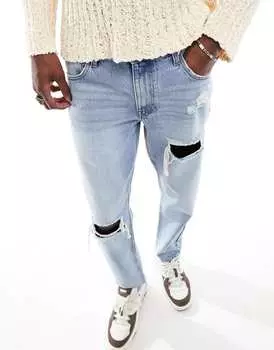 Светло-голубые классические жесткие джинсы с рваными краями ASOS DESIGN