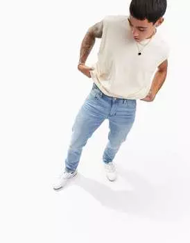 Светло-голубые узкие джинсы ASOS DESIGN