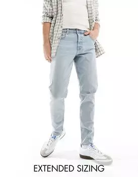 Светло-голубые зауженные джинсы с рваными краями ASOS DESIGN