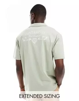 Светло-зеленая рубашка-поло оверсайз с принтом на спине ASOS DESIGN