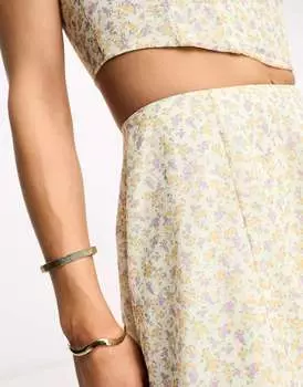 Светящаяся мини-юбка NA-KD x Phiaka с цветочным принтом