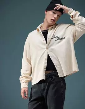 Свободная джинсовая рубашка с вышивкой на груди в цвете экрю ASOS DESIGN