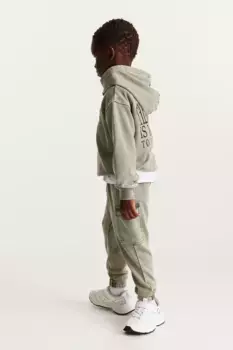 Свободные брюки-карго с застиранным эффектом H&M, зеленый