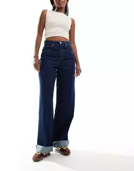 Свободные джинсы чернильного цвета с глубокими складками ASOS DESIGN