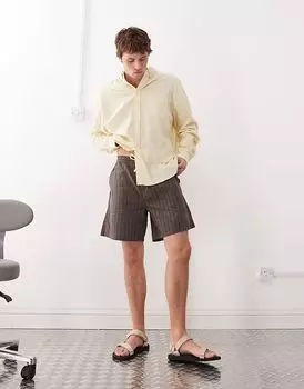 Свободные шорты Weekday в коричневую клетку