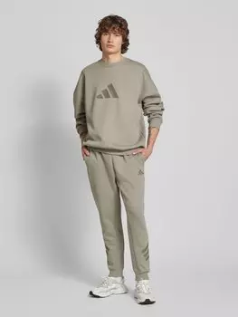 Свободные спортивные брюки с логотипом ADIDAS SPORTSWEAR, серо-коричневый