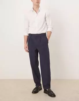 Свободные зауженные брюки со складками от ASOS DESIGN темно-синего цвета