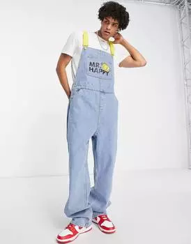 Свободный полукомбинезон ASOS DESIGN средней стирки с логотипом Mr Happy и контрастными лямками