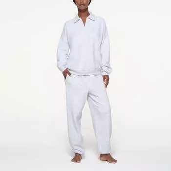 Свободный свитер с застежкой-молнией на четверть длины SKIMS, цвет light heather grey