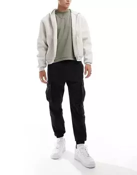 Tech брюки-карго черного цвета Bershka