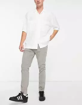 Темно-серые вельветовые брюки скинни ASOS DESIGN