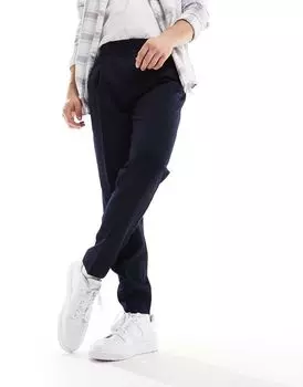 Темно-синие брюки зауженного кроя ASOS DESIGN
