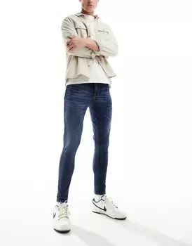 Темно-синие джинсы ASOS Power Stretch на джинсах