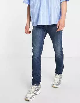 Темно-синие джинсы скинни стрейч ASOS DESIGN