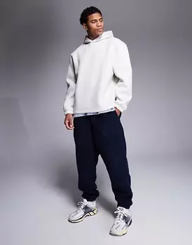 Темно-синие джоггеры свободного кроя ASOS DESIGN