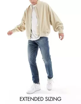 Темно-синие узкие джинсы ASOS DESIGN