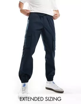 Темно-синие зауженные брюки ASOS DESIGN