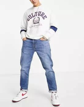 Темно-синие зауженные джинсы высокого кроя Levi's 502