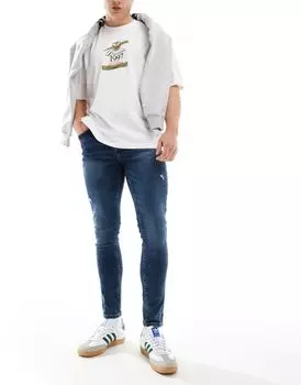Темно-синий спрей для эластичных джинсов с потертостями ASOS DESIGN