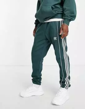 Темно-зеленые джоггеры с тремя полосками adidas Originals Rekive