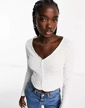 Текстурированная кнопка Urban Revivo сверху цвета слоновой кости.