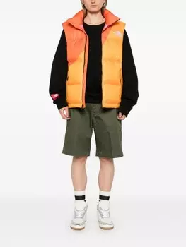 The North Face дутый жилет из коллаборации с Yinka Ilori, оранжевый