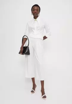 Тканевые брюки CROPPED LOW PLEATED Norma Kamali, кремовый