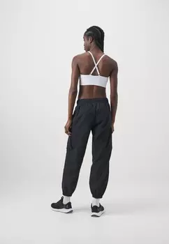 Тканевые брюки UNSTOPPABLE CARGO PANT Under Armour, черный