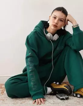 Толстовка с капюшоном COLLUSION зеленого цвета с логотипом