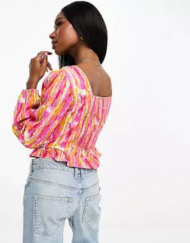 Топ с оборкой спереди и розовым и оранжевым графическим принтом