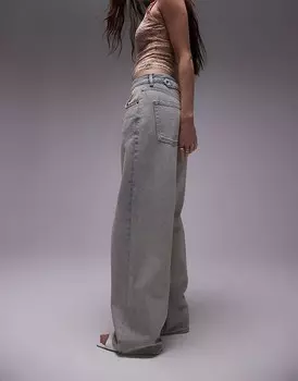Topshop — джинсы с низкой посадкой и винтажной выбеленной лямкой сзади