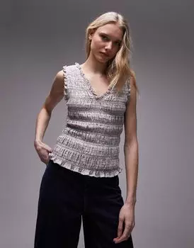 Topshop — топ со сборками в разноцветную полоску, который можно носить разными способами