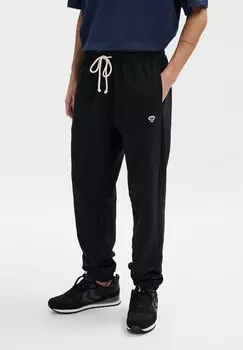 Тренировочные брюки UNISEX Hummel, черный