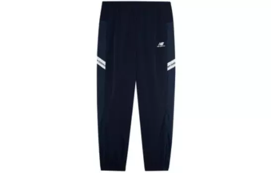 Трикотажные спортивные штаны унисекс темно-синие New Balance, темно-синий