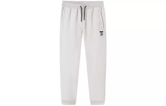 Трикотажные спортивные штаны Variety Training Collection для мужчин, цвет овсянка серый Anta, серый