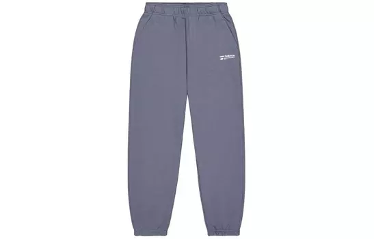 Трикотажные спортивные штаны женские фиолетовые New Balance