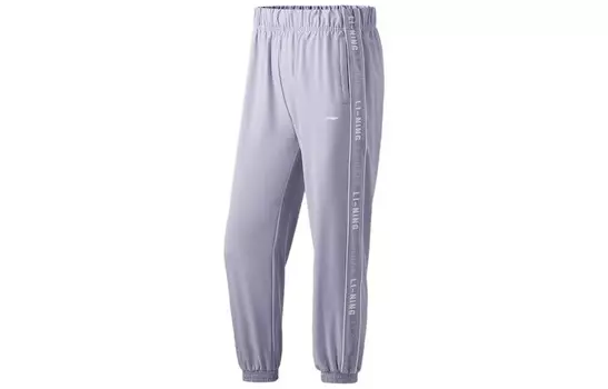 Трикотажные спортивные штаны женские сиреневые Lining