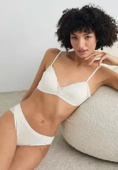 Трусы MODERN COORDINATE TANGA Calvin Klein Underwear, молочный