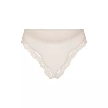 Трусы танга SKIMS, цвет stone