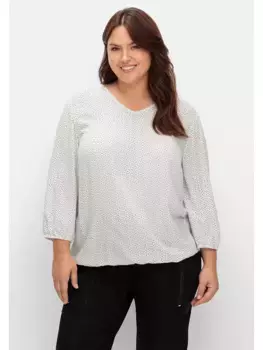 Туника Шиго "Большие размеры" с V-образным вырезом и принтом по всей поверхности Sheego, белый