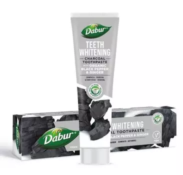 Угольная зубная паста отбеливающая с перцем и имбирем, 100 мл Dabur