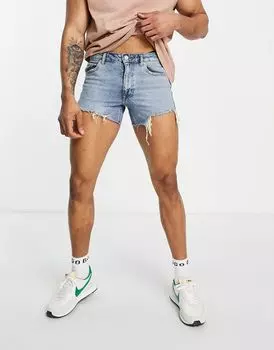 Укороченные джинсовые шорты ASOS DESIGN в стиле 90-х с рваными деталями и необработанным краем по низу