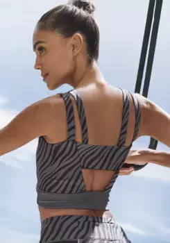 Укороченный топ LASCANA ACTIVE "- спортивный топ, короткий топ ", с рисунком "зебра" и вырезами на спине, черный