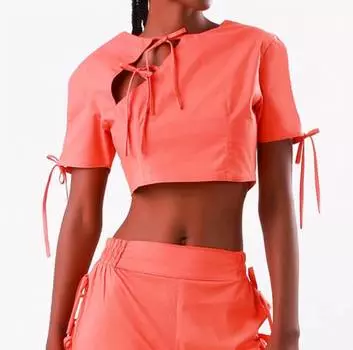 Укороченный топ с бантами оранжевого цвета Bela Brand