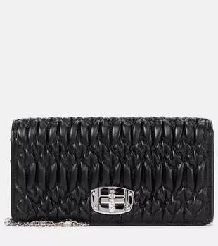 Украшенный матлассе клатч из кожи Miu Miu, черный