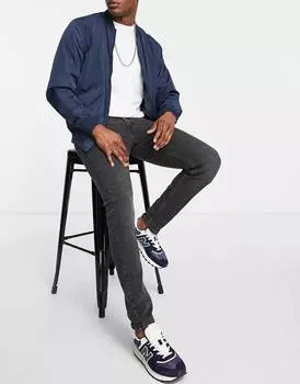 Узкие джинсы Levi's 512 из денима черного цвета с эффектом потертости