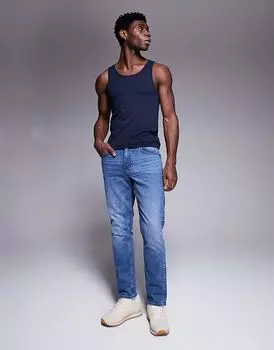 Узкие джинсы с оттенком в сине-голубой цвет ASOS DESIGN