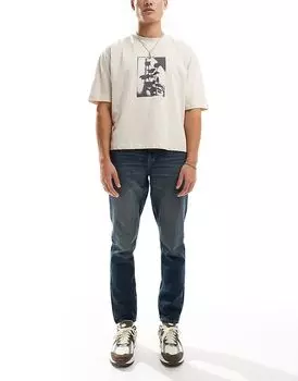 Узкие джинсы темного цвета с оттенком ASOS DESIGN